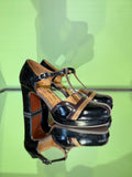 Angled view of Chie Mihara DITORA49 black and brown multi-strap heels