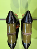 Pair of Chie Mihara TEIL black and ocher leather shoes