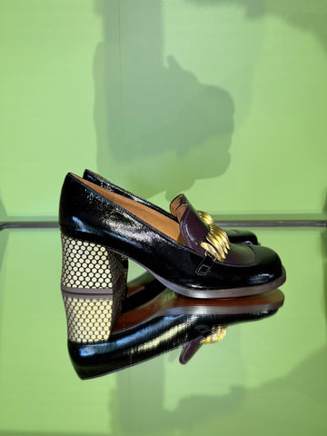 Side view of Chie Mihara TIBRO multi leather shoes with black and patterned panels