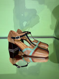 Angled view of Chie Mihara VOLA149 brown and black T-bar shoes