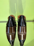 Pair of Chie Mihara XUDAI black croc-embossed leather shoes
