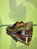 Pair of Chie Mihara XYZEN green and brown leather shoes