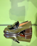 Side view of Chie Mihara XYZEN green and brown leather shoes